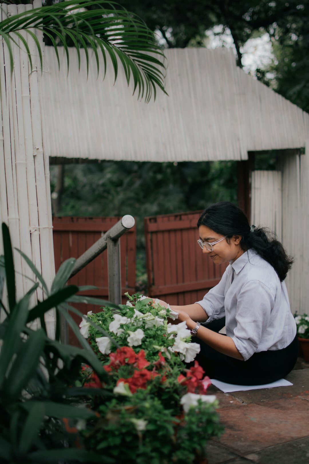woman planting summer flowers